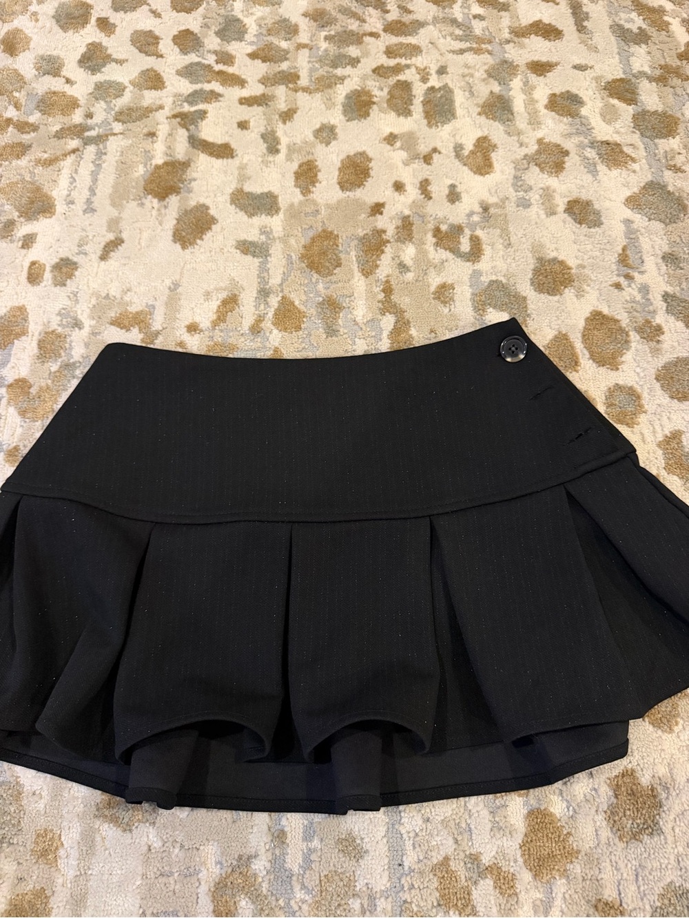 Black Pleated Mini Skirt with Button Accent